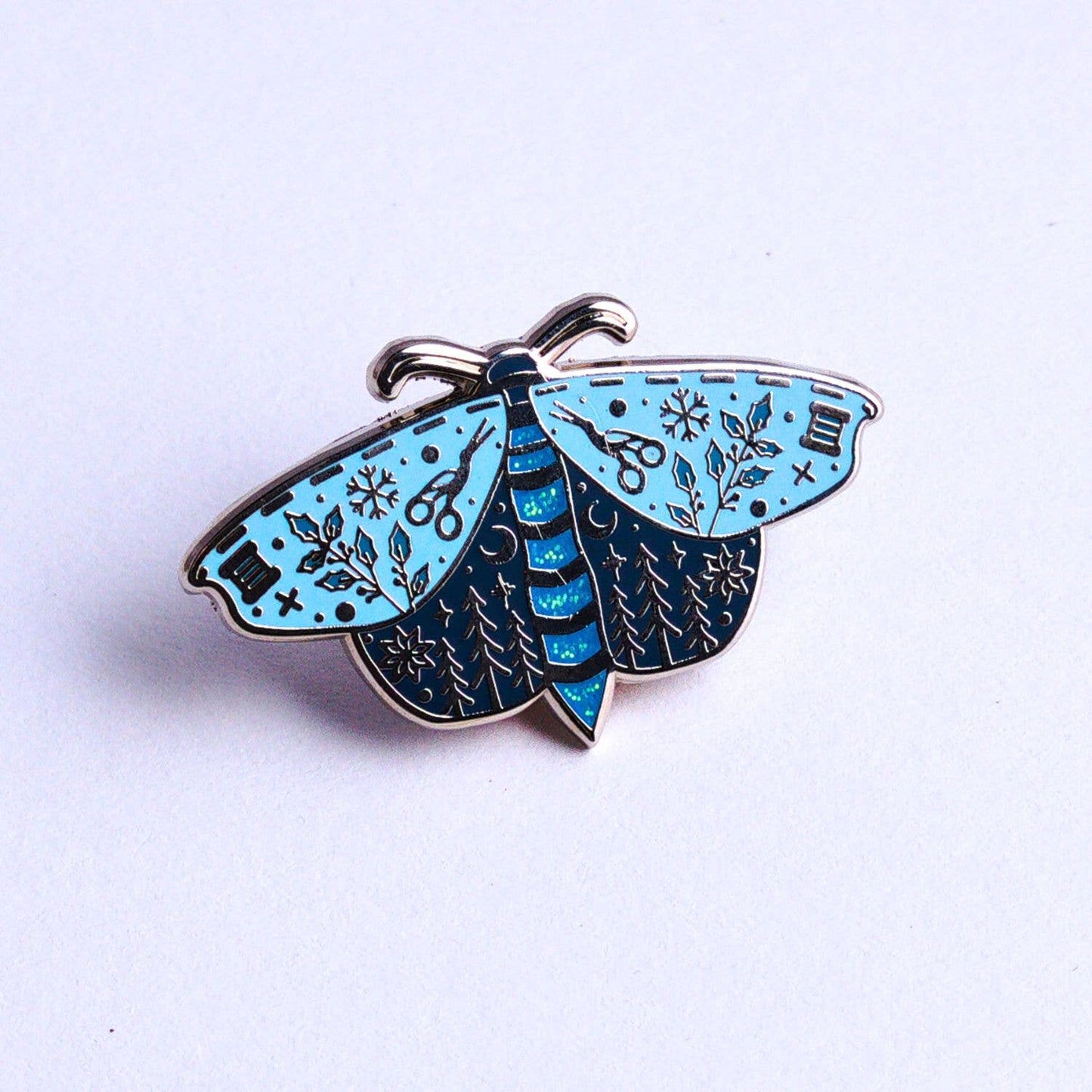 Snow Moth Needle Minder