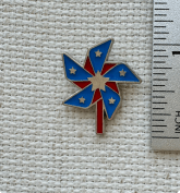 USA Pinwheel Enamel Needle Minder