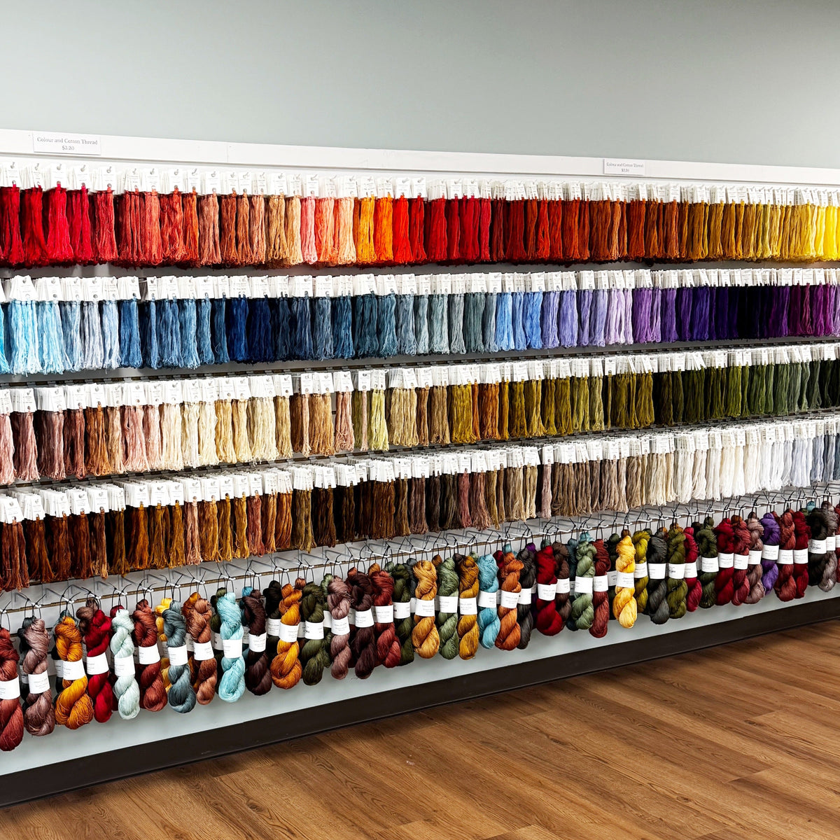Colour and Cotton hand-dyed embroidery thread arranged by color