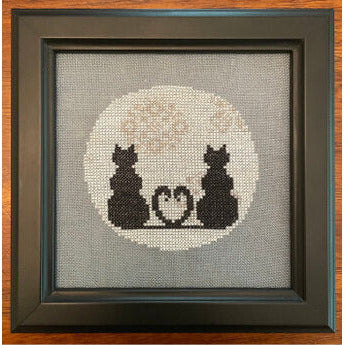 2 Cats and a Moon Pattern