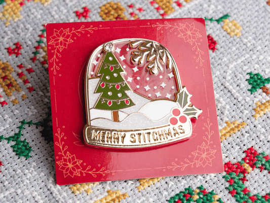 Sneeuwbol Needle Minder