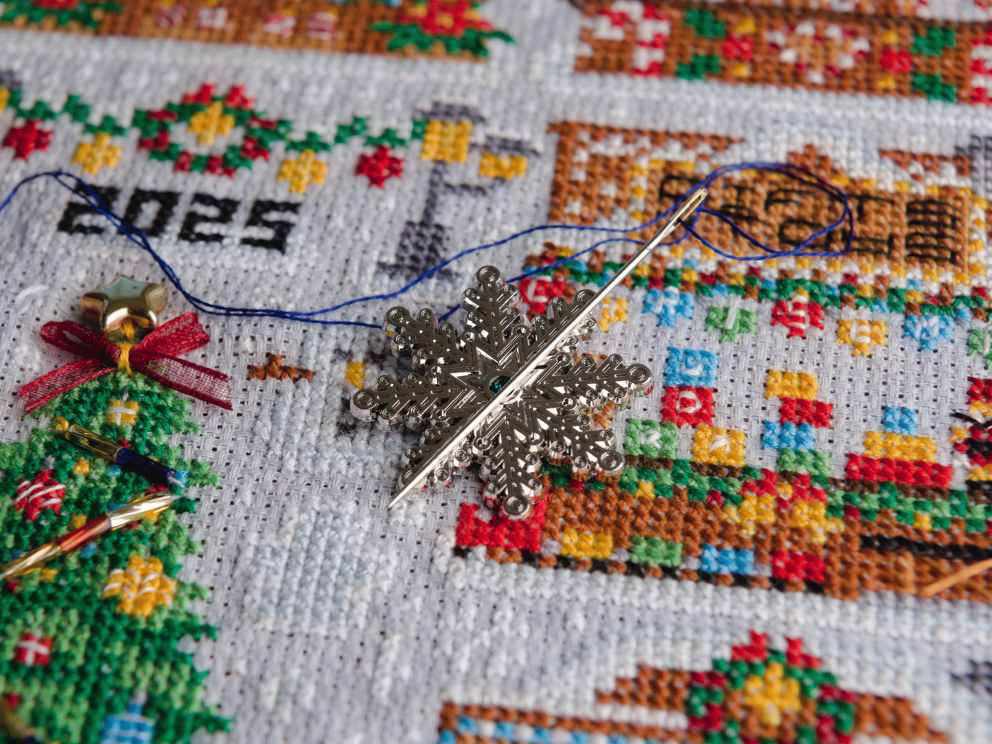 Sneeuwvlok Needle Minder