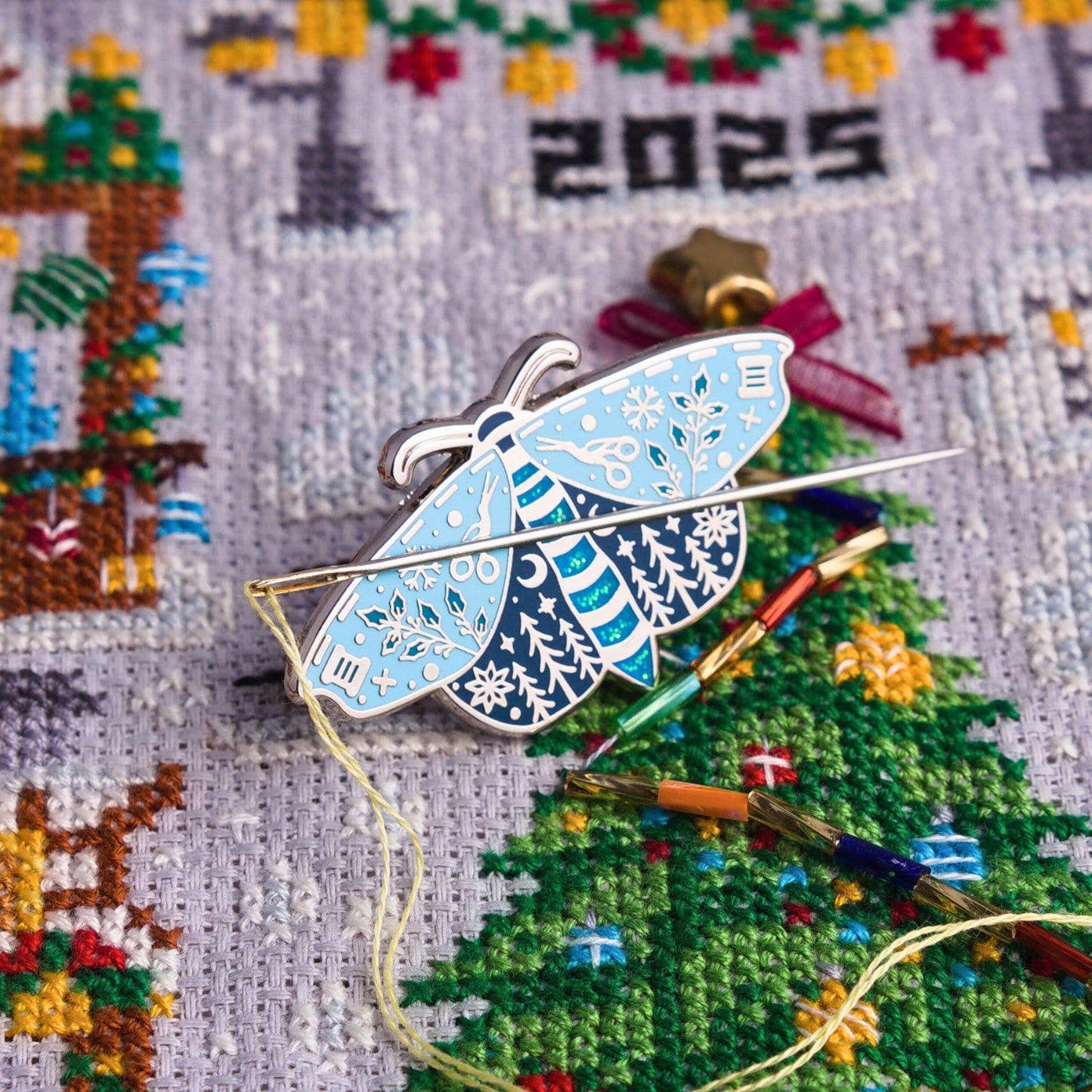 Snow Moth Needle Minder