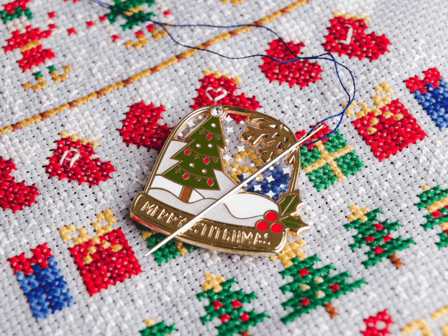 Sneeuwbol Needle Minder
