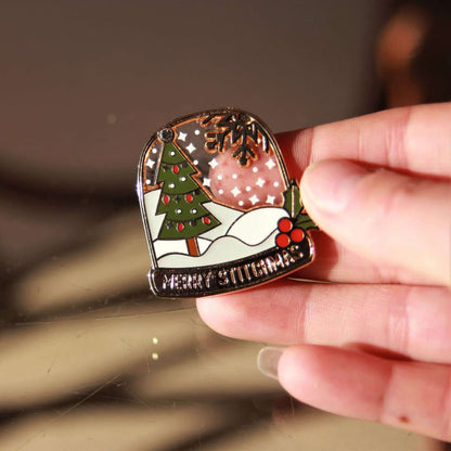 Sneeuwbol Needle Minder